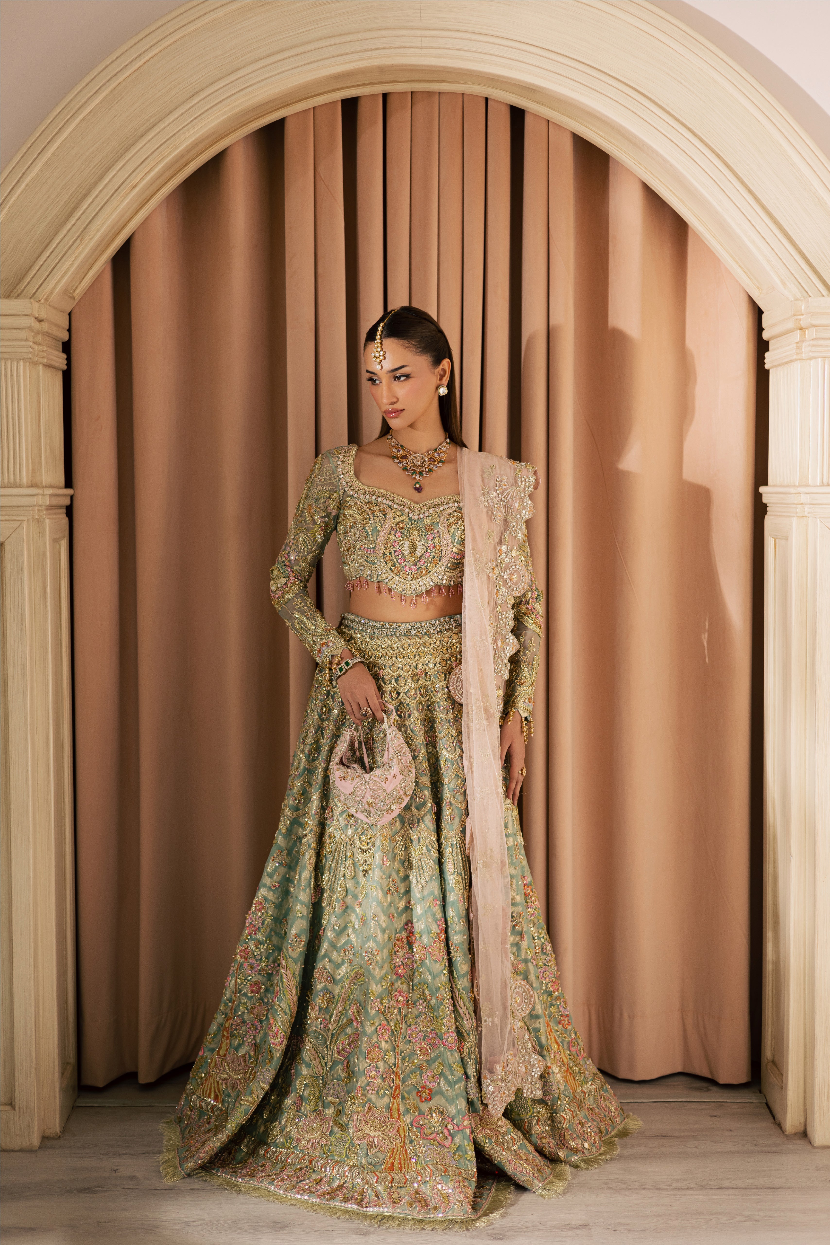 Arzu’25 collection by Mysie by Tahira showcasing pastel luxury bridal lehengas and festive shararas with hand-crafted embellishments, pearls, and couture details for modern South Asian women.