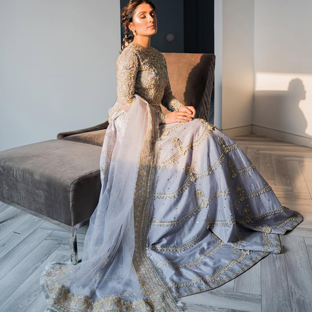 Ayeza Khan wearing Pakistani bridal lehnga in ice-blue with organza choli and net dupatta - Mysie By Tahira