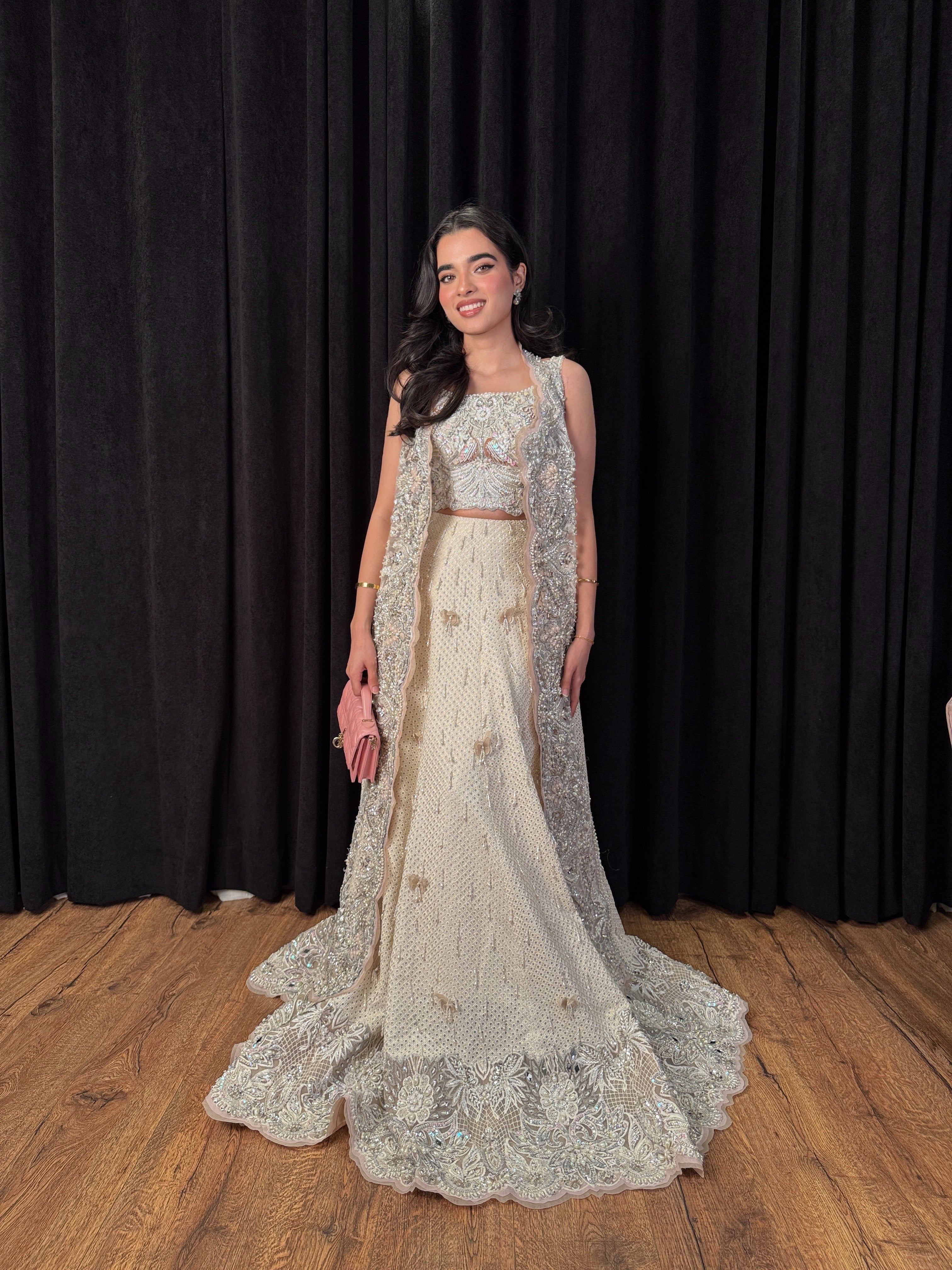 Designer ivory lehenga choli with embellished long jacket – Minsa outfit by Mysie by Tahira, Pakistani wedding and occasion wear.
