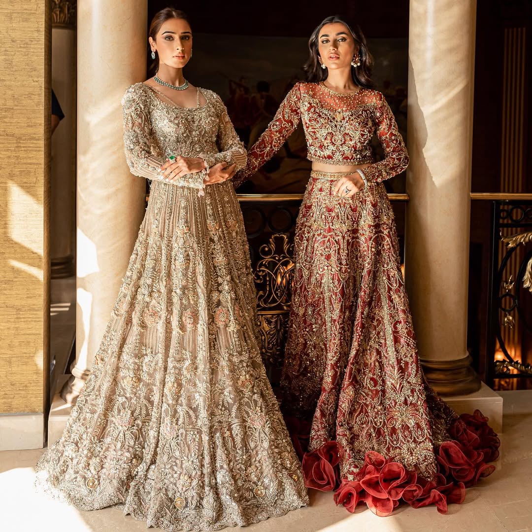 Luxury bridal lehnga choli in deep red with gold details by Mysie by Tahira