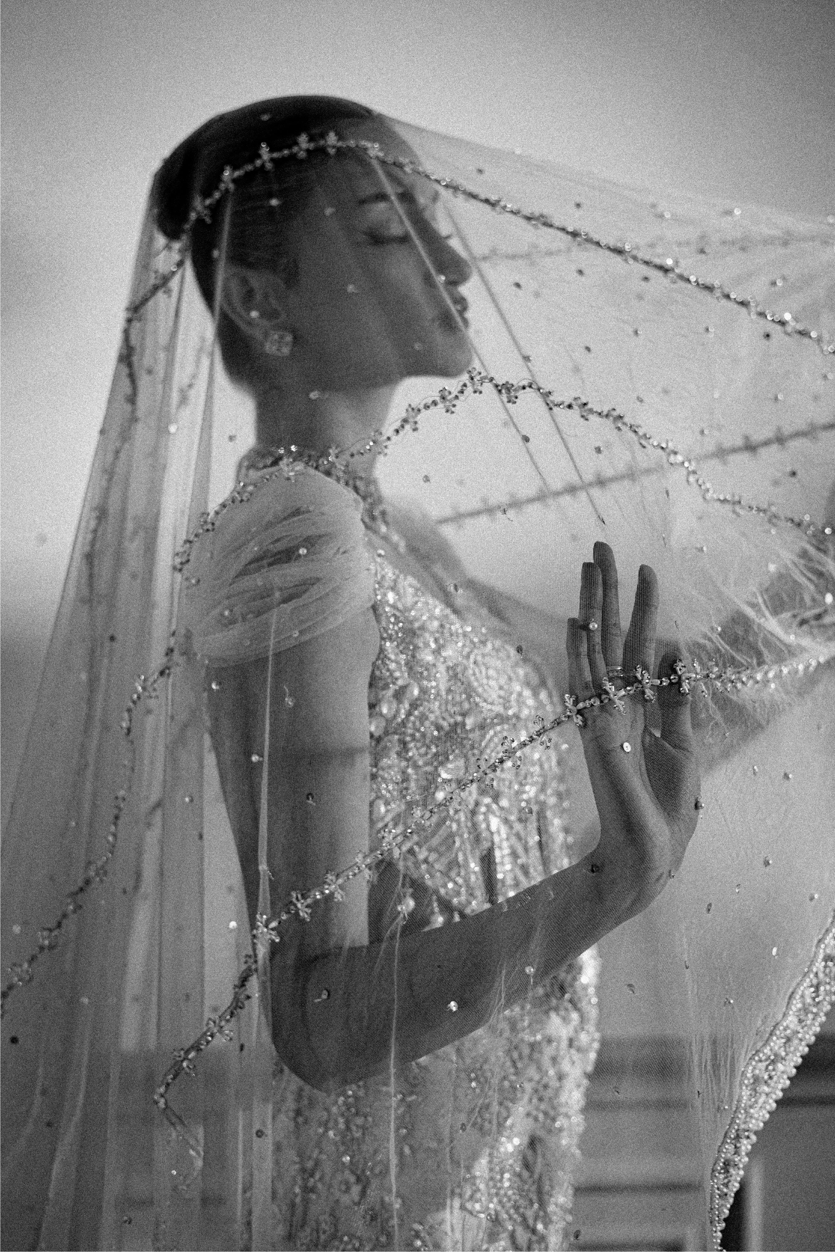 Beige-ivory luxury Radhika bridal lehenga with embellished choli and net dupatta by Mysie By Tahira.