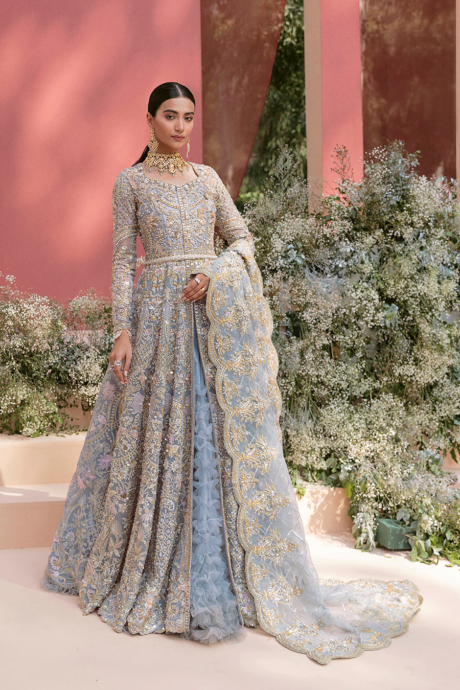 Pieta luxury Pakistani bridal outfit in ice blue organza with delicate embroidery and gold detailing.