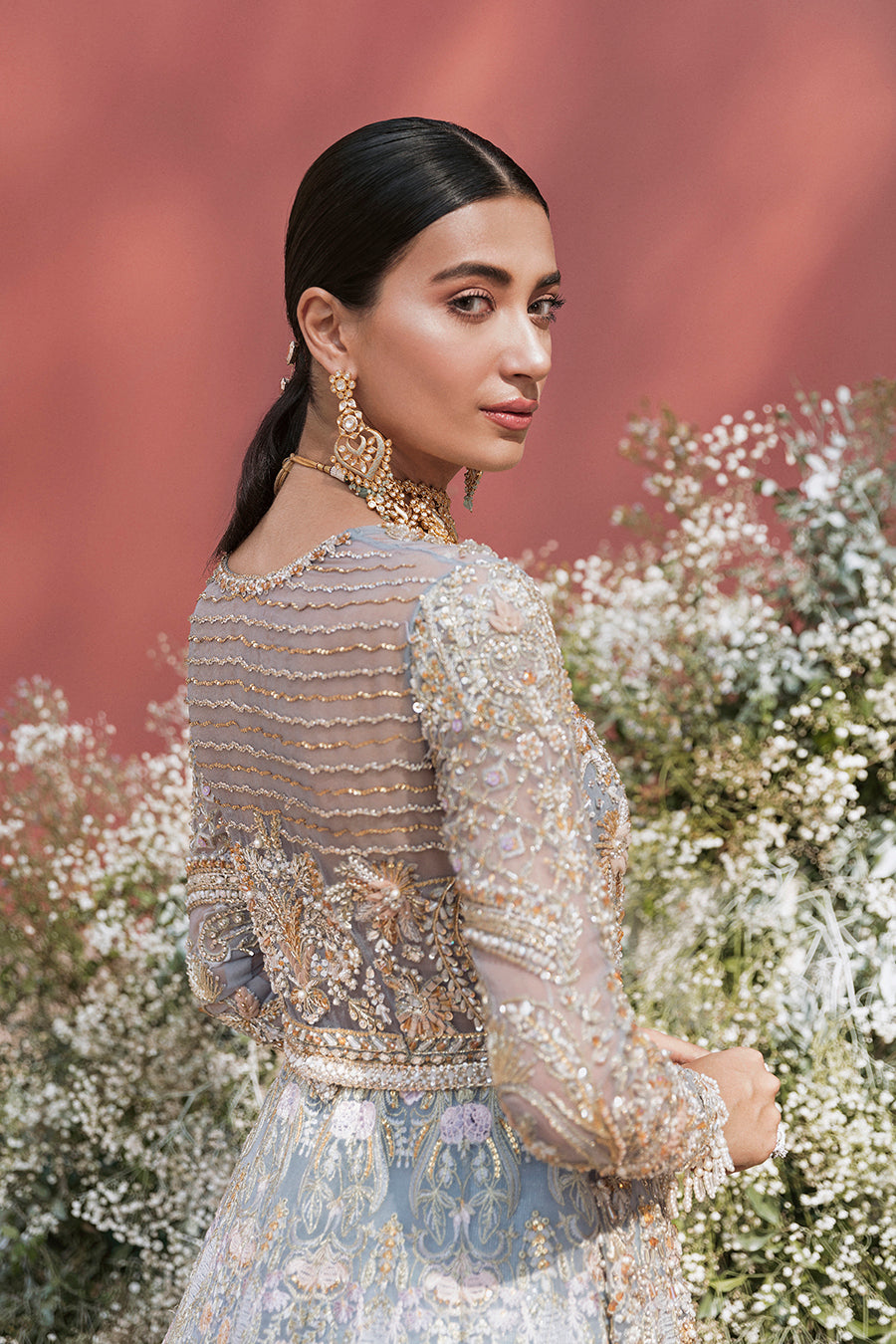 Pieta luxury Pakistani bridal outfit in ice blue organza with delicate embroidery and gold detailing.