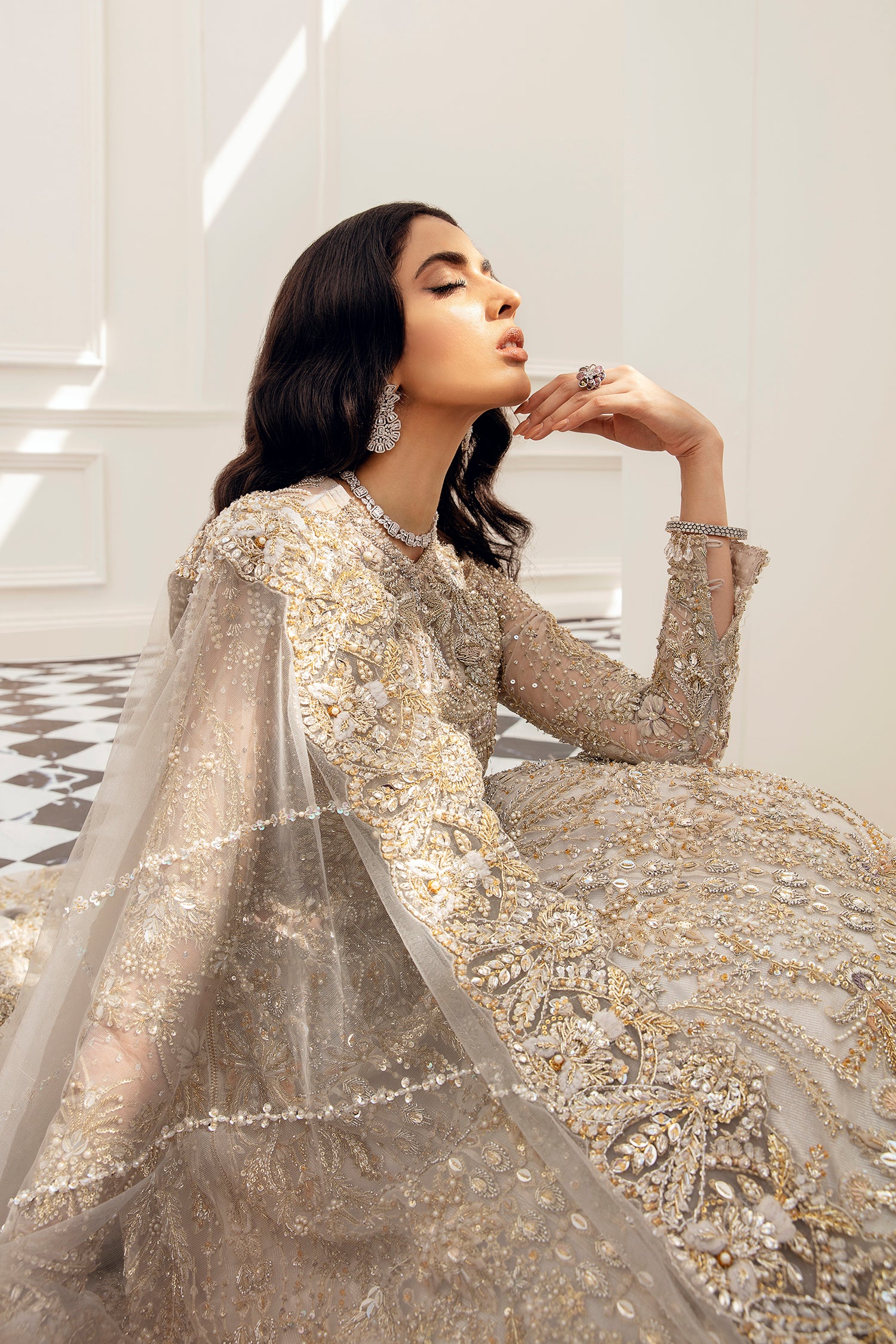 Amber bridal dress grey organza gown with Mughal-inspired embroidery – Pakistani luxury bridal fashion.