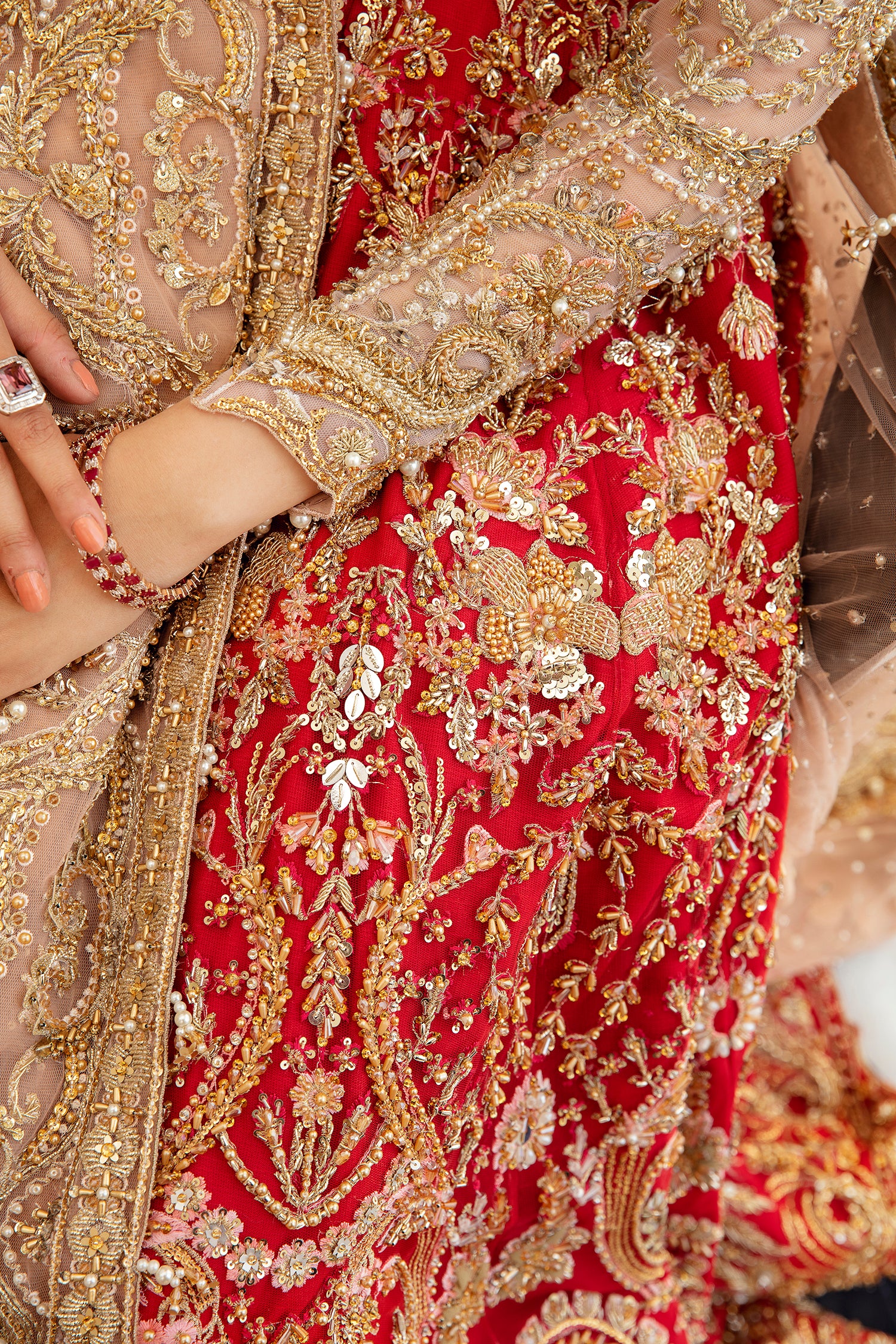 Pakistani bridal dress Kahlo – red lehnga with peach dupatta and hand embroidery.
