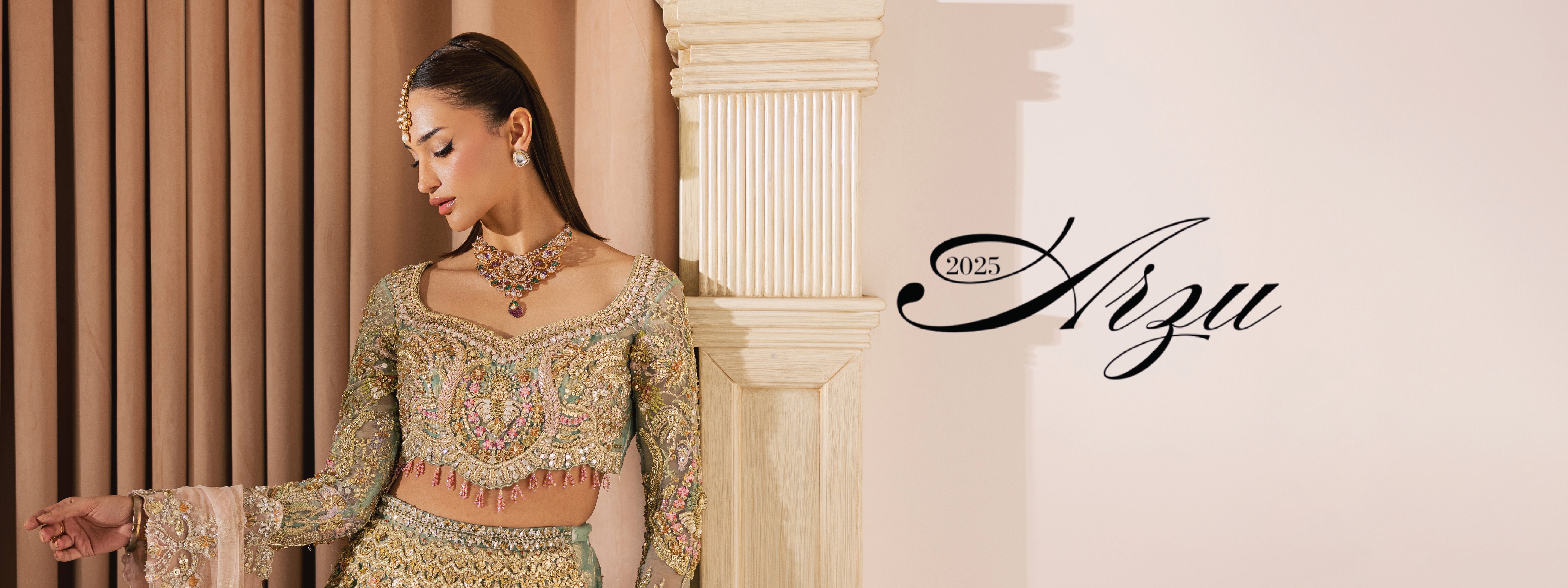 High-end Pakistani designer collection Arzu’25 featuring hand-embellished couture lehengas, tissue shararas, and net dupattas in modern pastel tones.