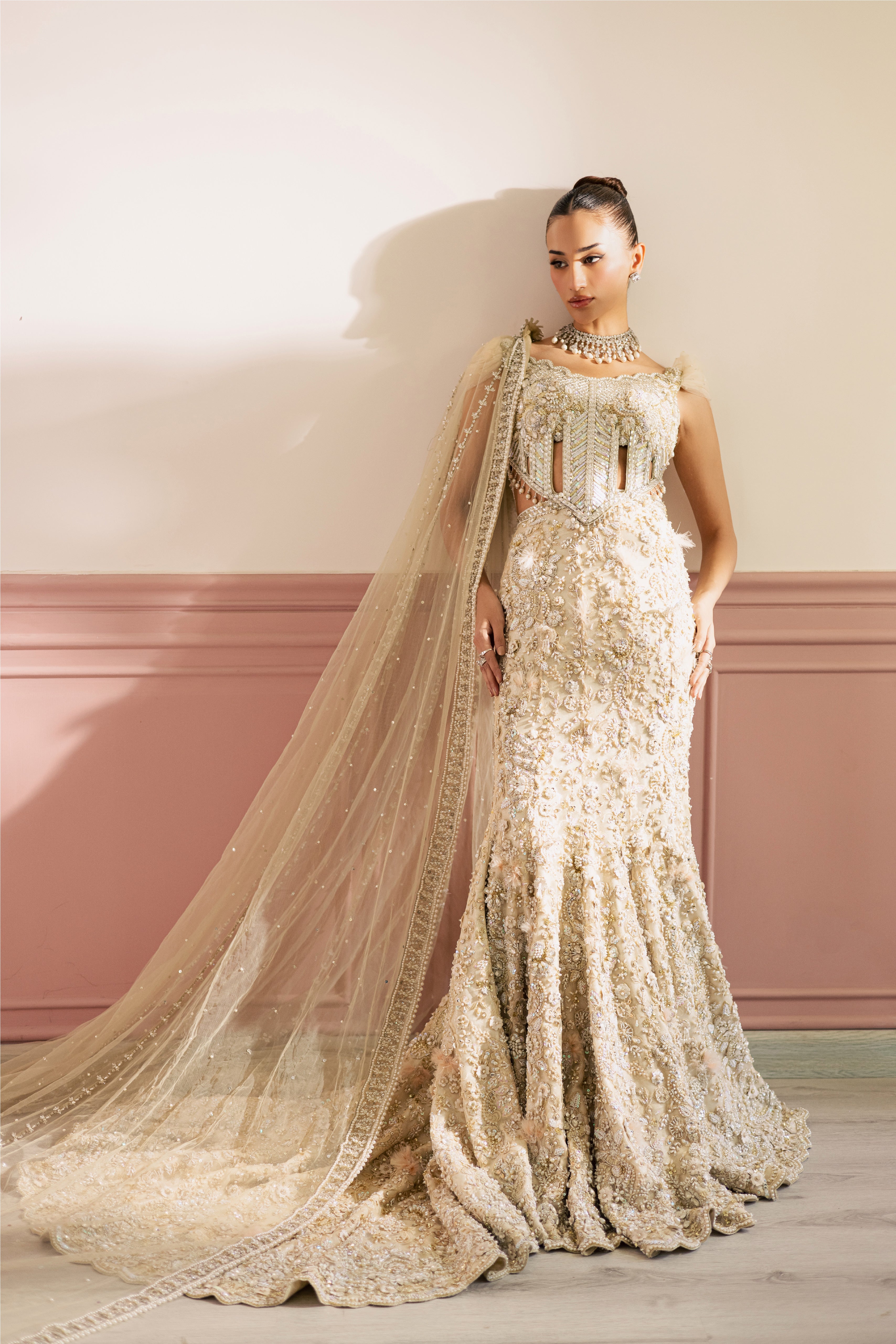 Beige-ivory luxury Radhika bridal lehenga with embellished choli and net dupatta by Mysie By Tahira.