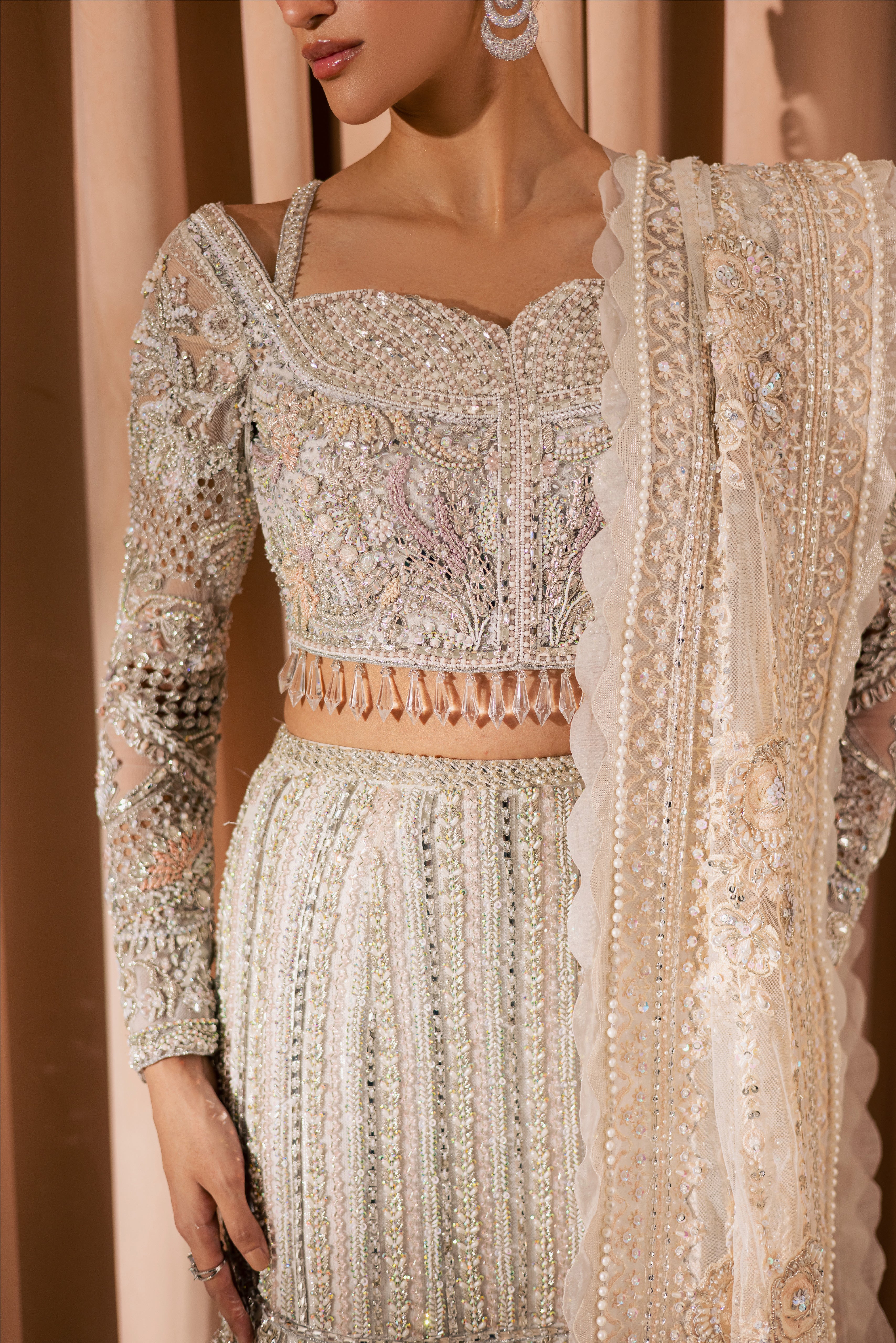 White Vanya luxury bridal mermaid lehenga with heavy embellishment - Mysie By Tahira.