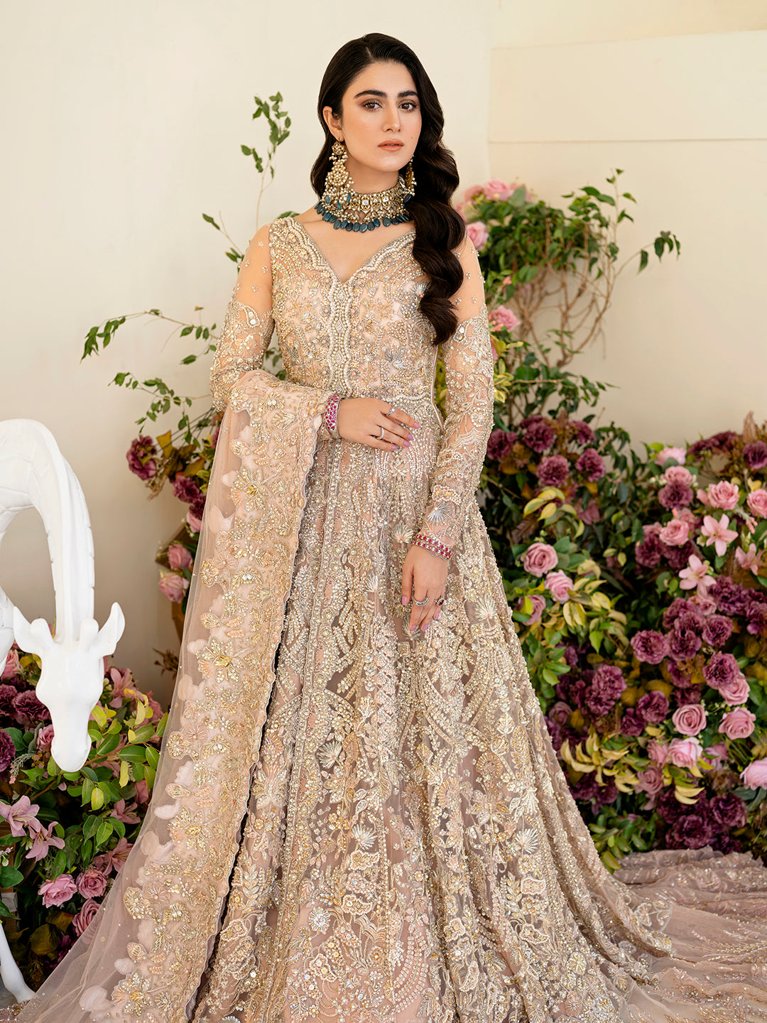 Gulmeena soft pink bridal outfit with floral hand embroidery and raw silk lehenga.