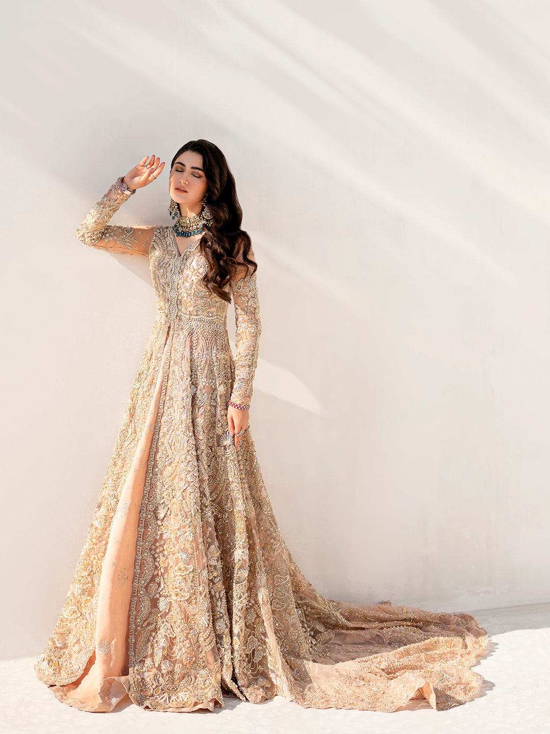 Gulmeena soft pink bridal outfit with floral hand embroidery and raw silk lehenga.