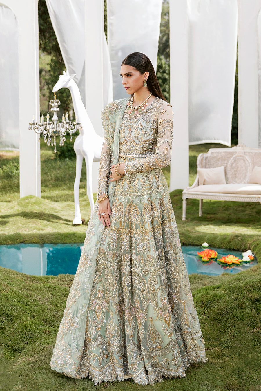 Luxury bridal ensemble Cleo in mint green with pearl embellishments on frock and raw-silk lehenga.