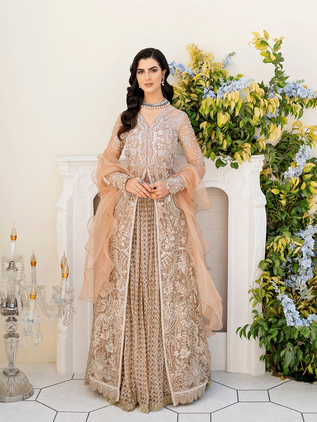 Ilama luxury formal outfit in muted peach and gold for Pakistani weddings.
