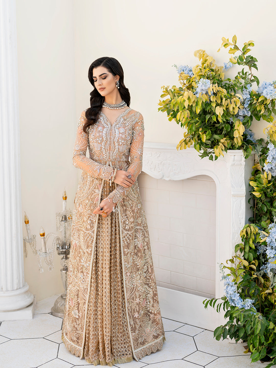 Ilama luxury formal outfit in muted peach and gold for Pakistani weddings.